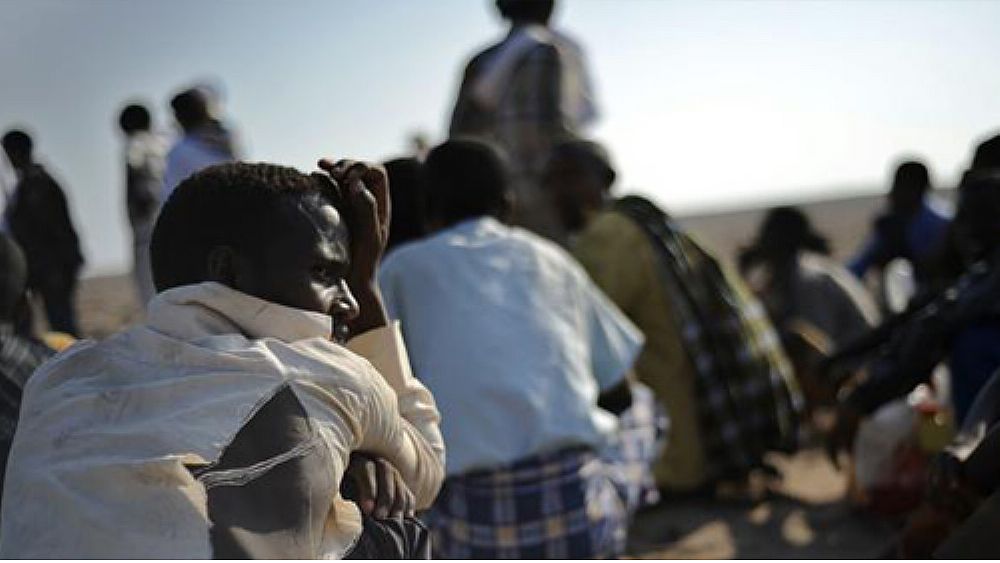 27012017 migranti di spalle