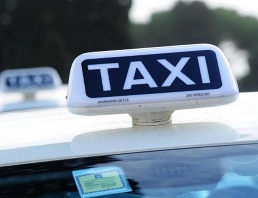 taxi insegna comune